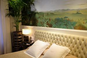 Cama ou camas em um quarto em Mirador de Dalt Vila-Relais & Chateaux