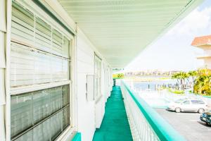 a balcony of a building with a view of a street at The BoatHouse in Marco Island