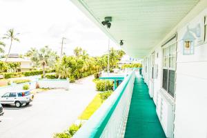 a view from the balcony of a beach house at The BoatHouse in Marco Island