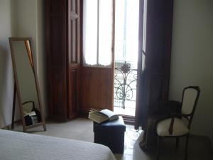 Postel nebo postele na pokoji v ubytování Hotel San Sebastián Hospedería