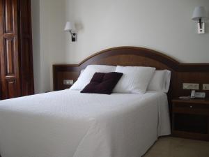 Postel nebo postele na pokoji v ubytování Hotel San Sebastián Hospedería