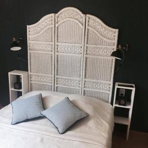 Ένα ή περισσότερα κρεβάτια σε δωμάτιο στο Chambres d'hôtes Les 7 Semaines