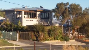 a house with a fence in front of it at Overmeer in Worcester