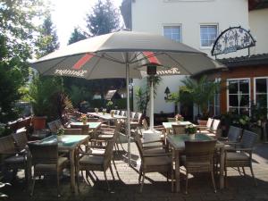 Un restaurant sau alt loc unde se poate mânca la Hotel Bergschlößchen