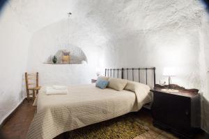 Katil atau katil-katil dalam bilik di Casas Cueva Tio Tobas Guadix
