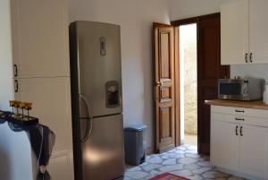 A kitchen or kitchenette at P&M House