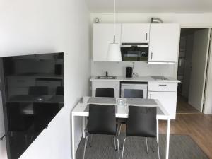 Kuchyň nebo kuchyňský kout v ubytování Hällestrand Seaview Apartment