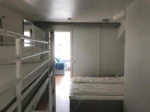 Postel nebo postele na pokoji v ubytování Hällestrand Seaview Apartment