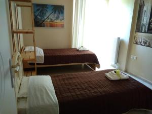 Cama o camas de una habitación en Villa K