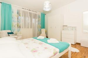 Postel nebo postele na pokoji v ubytování Apartment Lorenzo
