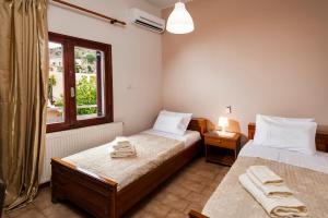 Tempat tidur dalam kamar di Falassarna House