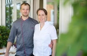 a man and a woman standing next to each other at Gasthaus Assenmacher in Altenahr