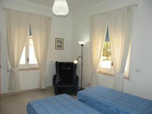 Postel nebo postele na pokoji v ubytování Appartamento Botticelli