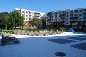 Bazén v ubytovaní Apartament Piaskowy Polanki Park alebo v jeho blízkosti