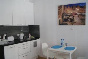 Kuchnia lub aneks kuchenny w obiekcie Stay99