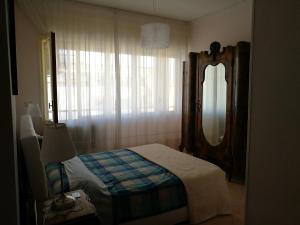Postel nebo postele na pokoji v ubytování B&B Domus Lupiae