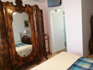 Postel nebo postele na pokoji v ubytování B&B Domus Lupiae