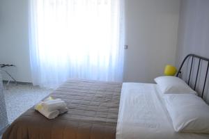 Postel nebo postele na pokoji v ubytování San Lorenzo