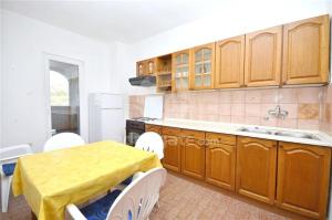 Kuchyň nebo kuchyňský kout v ubytování Apartments Anđelka + 24 fotografií