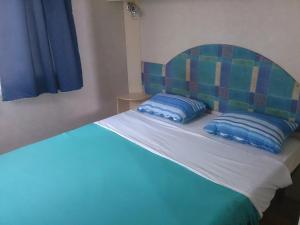 Postel nebo postele na pokoji v ubytování Camp Sita