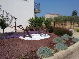 A garden outside B&B Itufi
