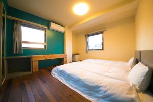Cama o camas de una habitación en HOTEL 910