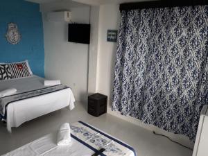Posada Ocean View客房内的一张或多张床位