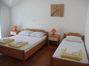 Cama o camas de una habitación en Apartments Marinovic Baćina Lakes