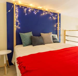 A bed or beds in a room at Jokai 3 Design Apartment
