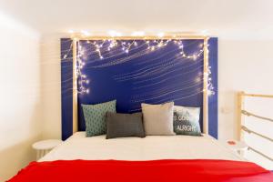 A bed or beds in a room at Jokai 3 Design Apartment
