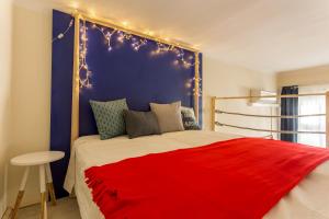 A bed or beds in a room at Jokai 3 Design Apartment