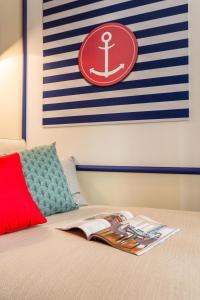 A bed or beds in a room at Jokai 3 Design Apartment