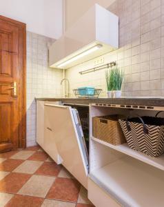 A kitchen or kitchenette at Jokai 3 Design Apartment