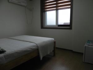 Jeonju International Hostel客房内的一张或多张床位