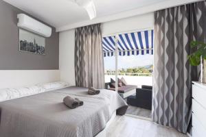 Ένα ή περισσότερα κρεβάτια σε δωμάτιο στο Apartment Pearl