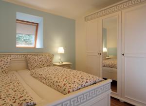 Ein Bett oder Betten in einem Zimmer der Unterkunft Strandvilla Muschel