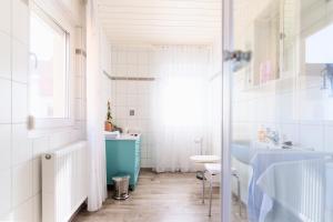Koupelna v ubytování Domizil Nunn + 37 fotografií