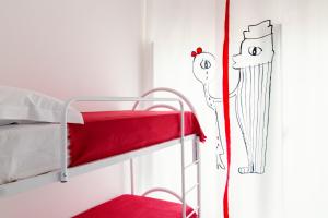 A bed or beds in a room at Shalai Relais Apartment