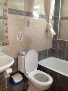 Koupelna v ubytování Eva Rooms