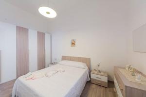 A bed or beds in a room at Casa vacanza Simone