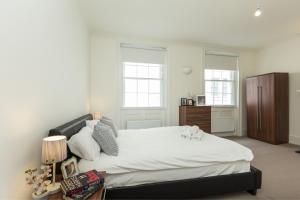 מיטה או מיטות בחדר ב-Covent Garden Oasis - 2 Bedrooms 2 Baths