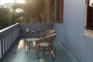 A balcony or terrace at Rabbani Family Homestay