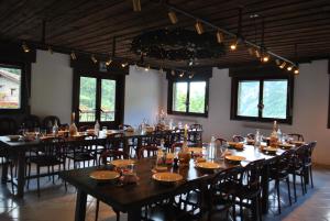 En restaurant eller et andet spisested på Hotell Millefiori- Alpine Event Lodge