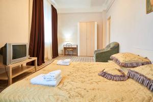 Postel nebo postele na pokoji v ubytování Home Hotel Apartments on Khreshchatyk Area