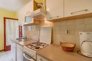 Kuchyň nebo kuchyňský kout v ubytování Apartment Marisa + 20 fotografií