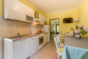 Kuchyň nebo kuchyňský kout v ubytování Apartment Marisa