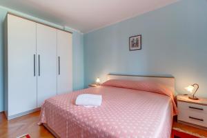 Postel nebo postele na pokoji v ubytování Apartment Marisa