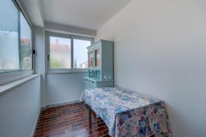Postel nebo postele na pokoji v ubytování Apartment Marisa