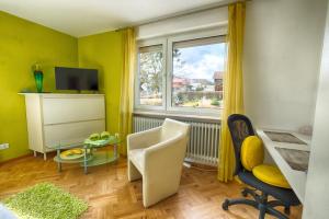 TV a/nebo společenská místnost v ubytování Pension Weinsberger Tal