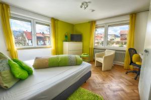 Postel nebo postele na pokoji v ubytování Pension Weinsberger Tal
